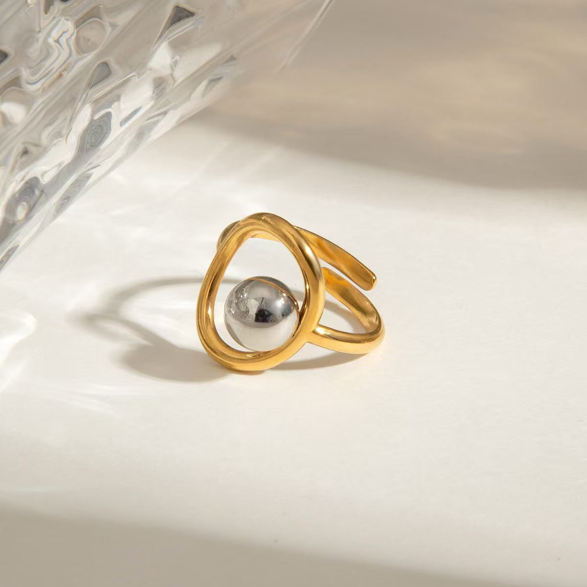 European and American stainless steel gold and silver color matching steel ball open ring French niche design personalized titanium steel cross-border hot sale